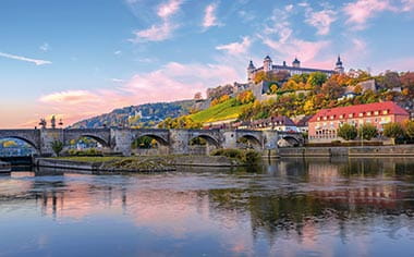 The bridge and Marienberg Fortress at sunset in Würzburg, Germany The bridge and Marienberg Fortress at sunset in Würzburg, Germany